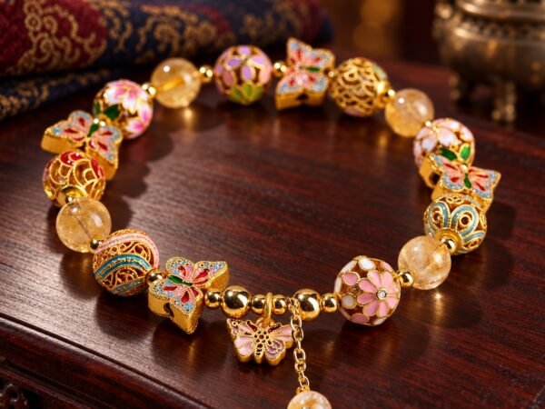 Butterfly Crystal Bracelet with golden rutilated quartz and colorful cloisonné charms